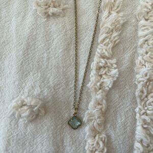Gold Necklace with light blue stone